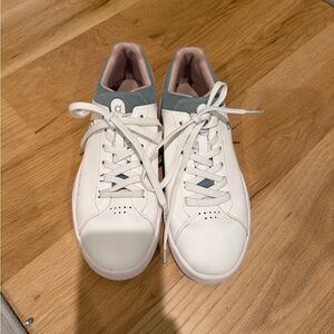 On Running White Sneakers with Gray and Pink Accents